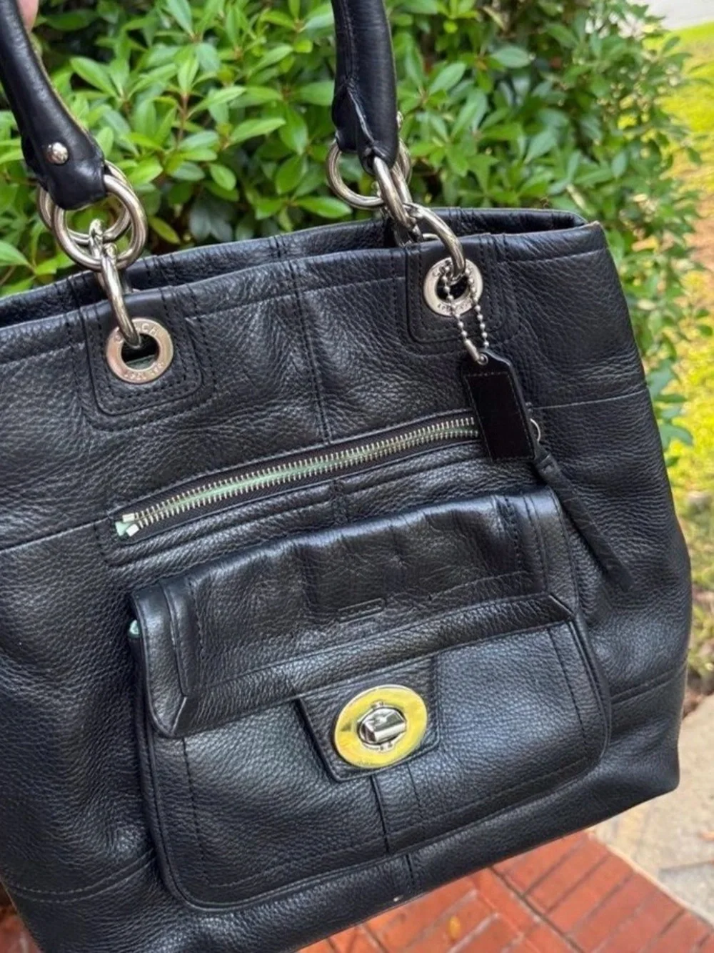 Coach Black Pebbled Leather Shoulder Tote with Turnlock Pocket.
